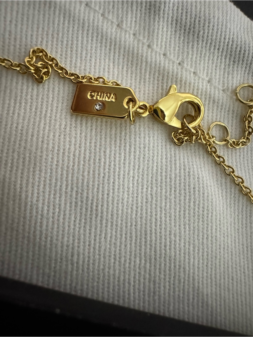 Coach Gold-Tone Logo Tag and Flower Charm Necklace - Picture 3 of 7